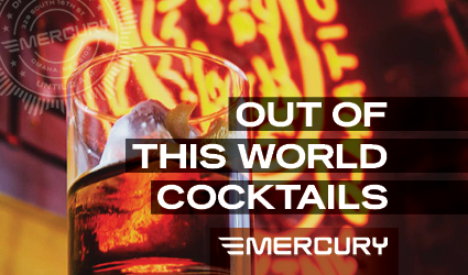 Sample ad for Mercury showing a drink on ice and the slogan "Out of this world cocktails"